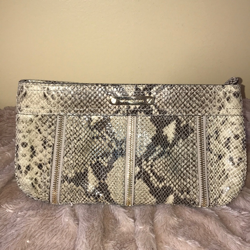 Snakeskin print clutch by MICHAEL Michael Kors